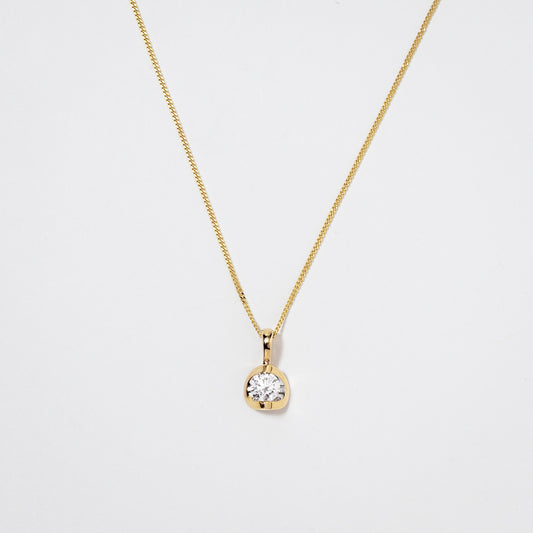 Tension Set Canadian Diamond Solitaire Necklace in 14K Yellow Gold (0.15ct tw)