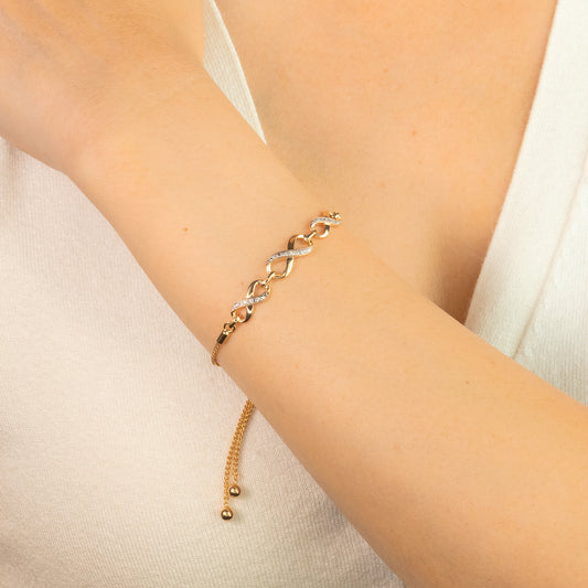 Infinity Bolo Style Bracelet in 10K Yellow Gold (0.05 ct tw)